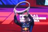 SHANGHAI, CHINA - APRIL 21: Race winner Max Verstappen of the Netherlands and Oracle Red Bull Racing celebrates on the podium during the F1 Grand Prix of China at Shanghai International Circuit on April 21, 2024 in Shanghai, China. (Photo by Lars Baron/Getty Images) // Getty Images / Red Bull Content Pool // SI202404210272 // Usage for editorial use only //
